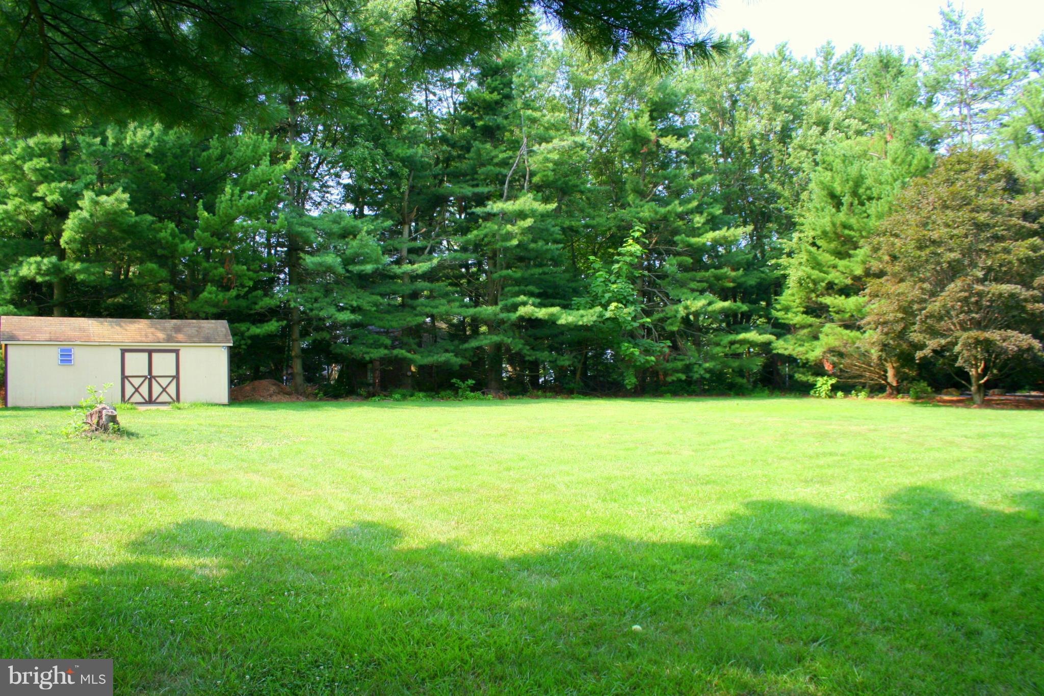 2901 Stockton Road Phoenix, MD 21131 - Photo 23 of 29 a view of a yard with a table and chair