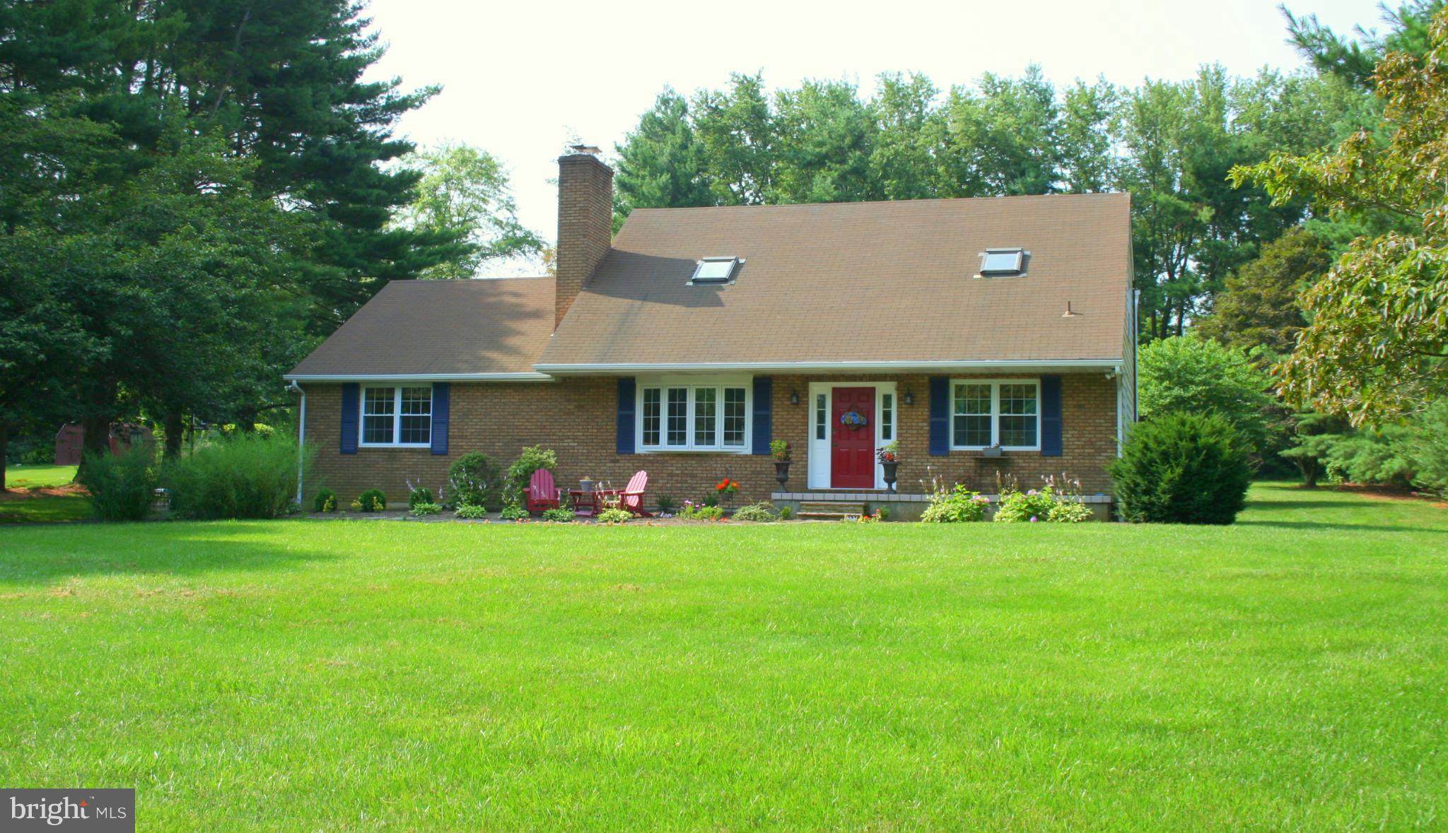 2901 Stockton Road Phoenix, MD 21131 - Photo 29 of 29 a front view of a house with a garden and porch