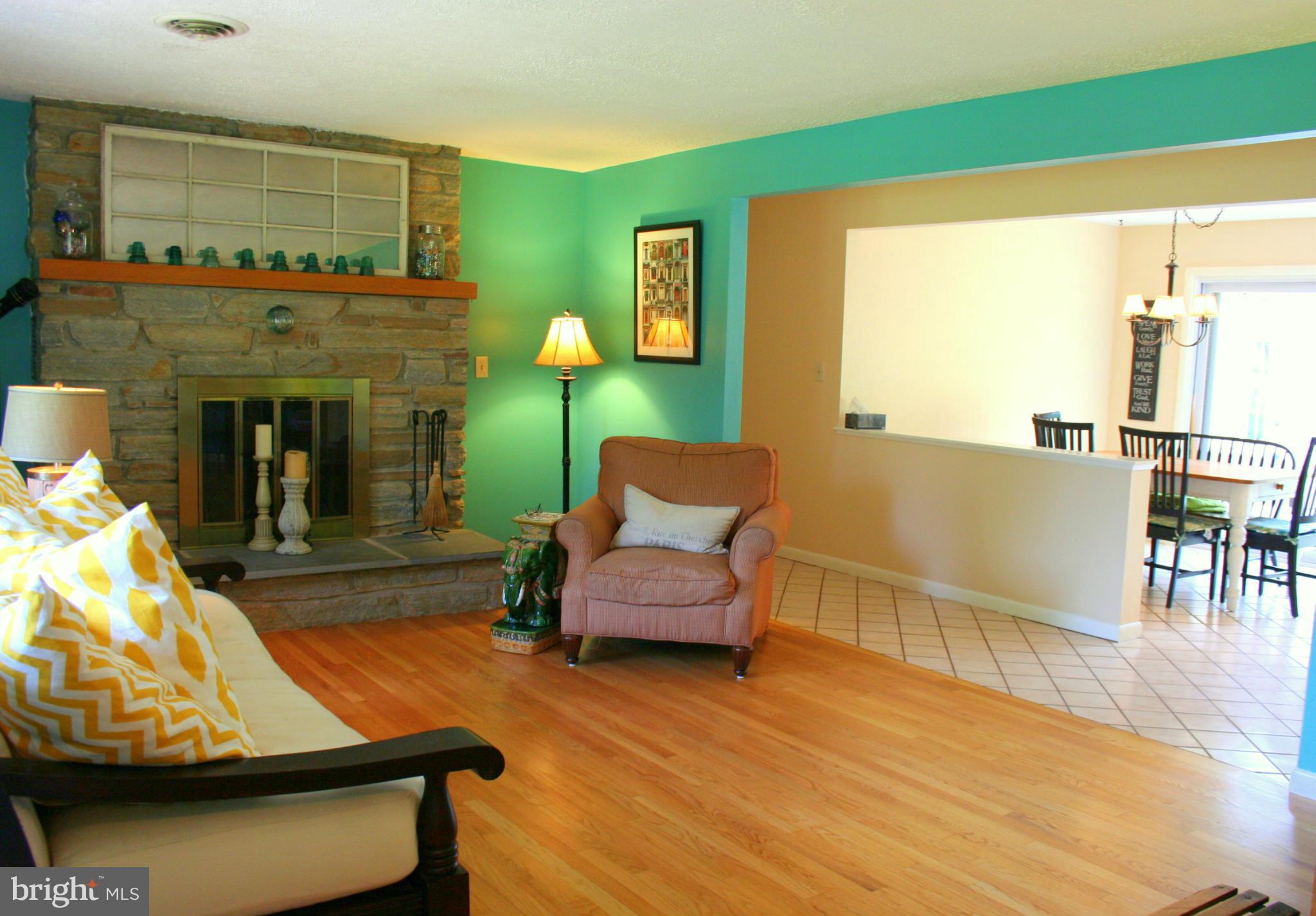 2901 Stockton Road Phoenix, MD 21131 - Photo 5 of 29 a living room with furniture and a fireplace