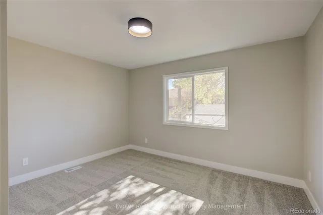 an empty room with a window