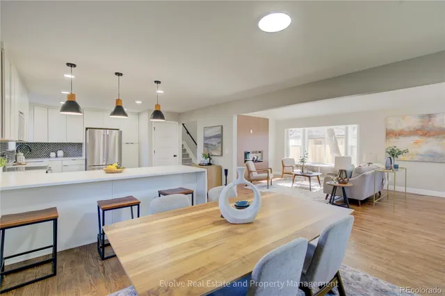 a view of kitchen dining table and chairs