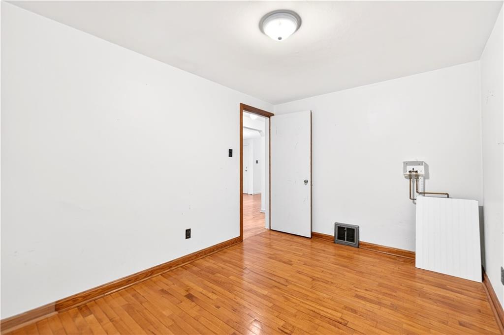 126 Bakers Lane Apollo, PA 15613 - Photo 13 of 28 a view of empty room with wooden floor