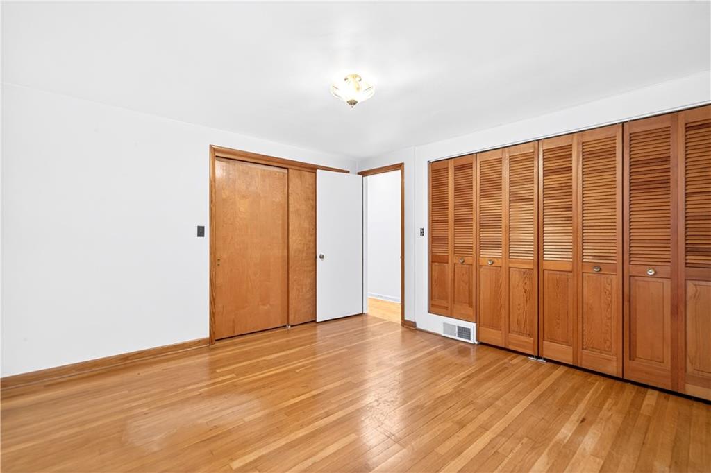 126 Bakers Lane Apollo, PA 15613 - Photo 15 of 28 a view of an empty room with wooden floor