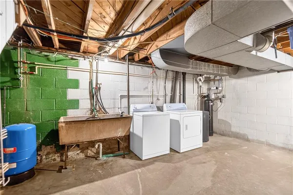 a view of a chairs and table in a patio