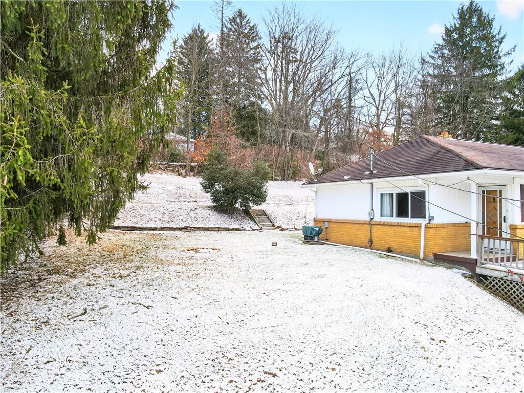 126 Bakers Lane Apollo, PA 15613 - Photo 25 of 28 a view of a house with a snow in the yard