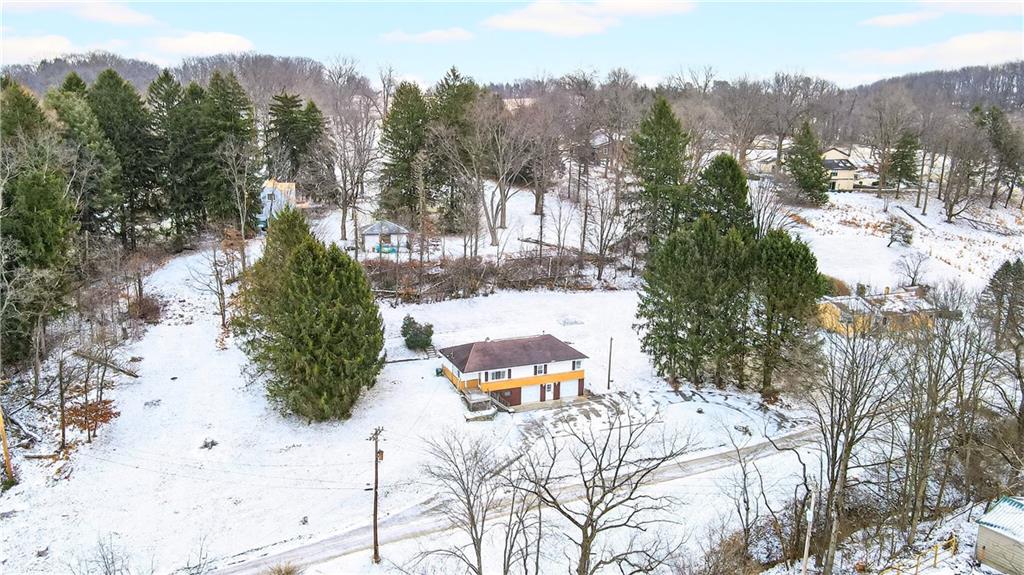 126 Bakers Lane Apollo, PA 15613 - Photo 27 of 28 a view of a city with lush green forest