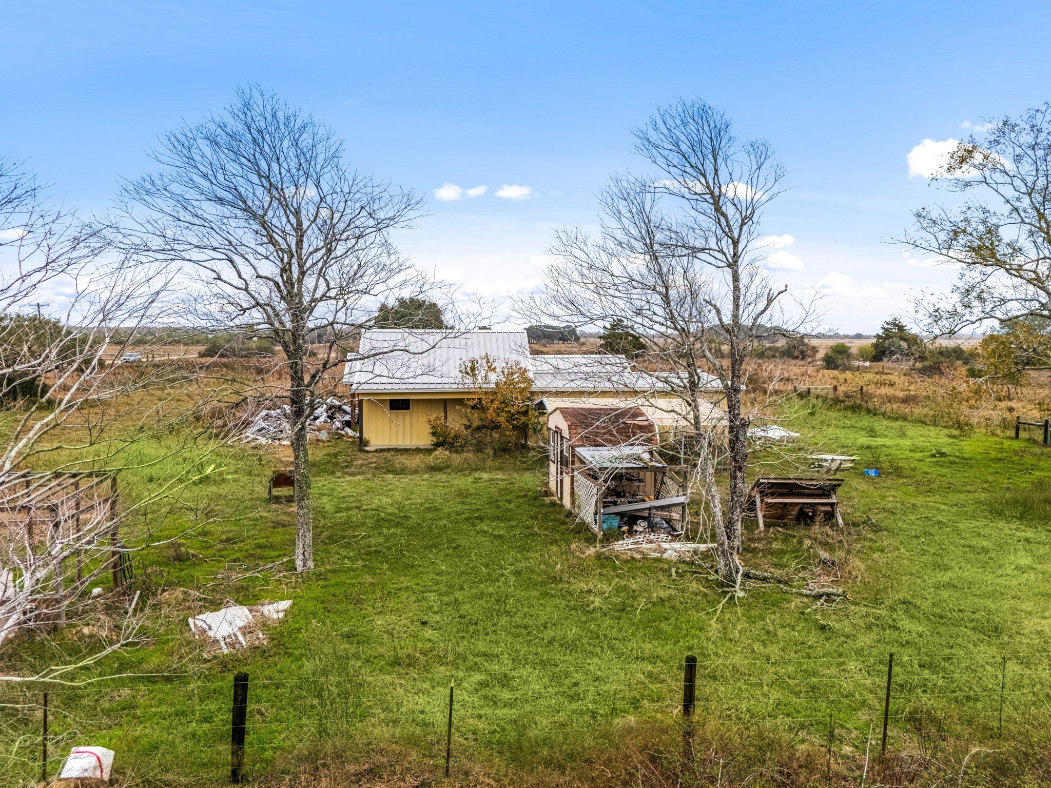 1187-1201 Ramsey Road Alleyton, TX 78935 - Photo 18 of 32 a backyard of a house with table and chairs