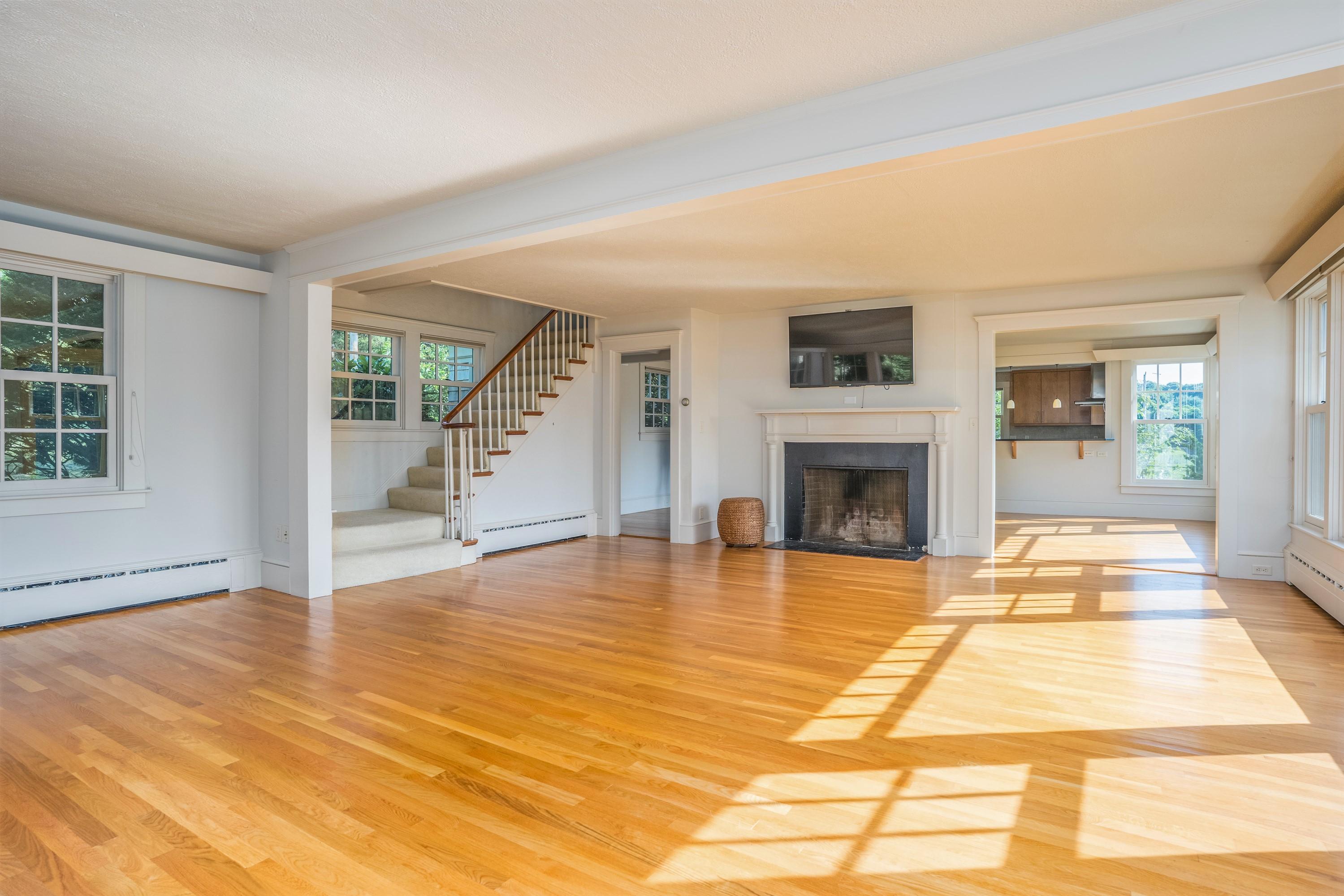 268 Elm Road Falmouth, MA 02540 - Photo 12 of 29 a view of an empty room with wooden floor and a window