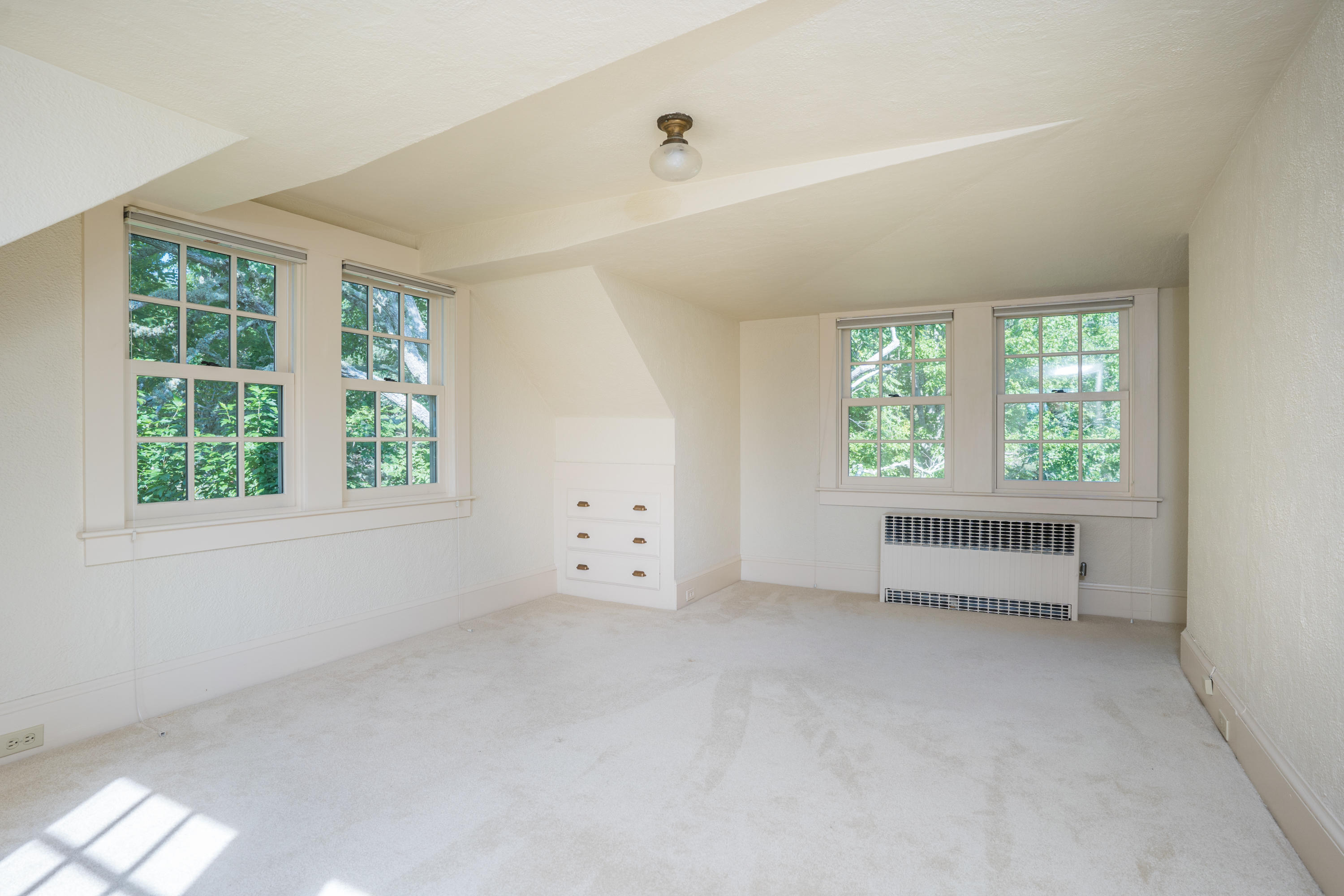 268 Elm Road Falmouth, MA 02540 - Photo 15 of 29 an empty room with windows and ceiling fan