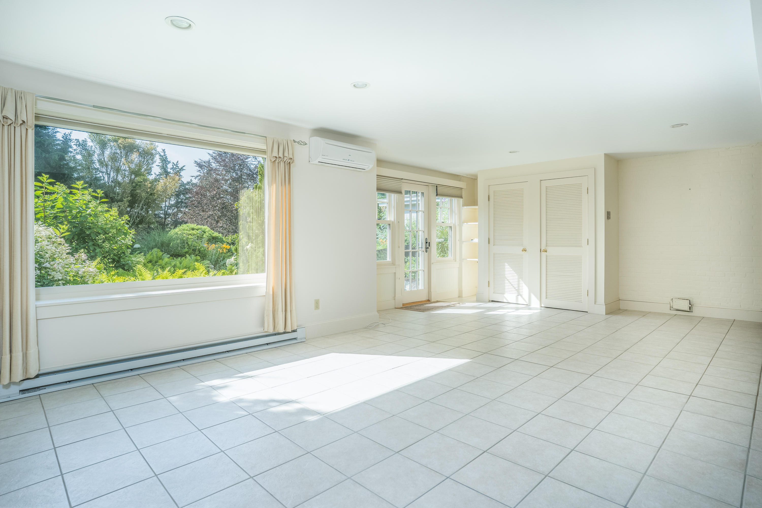 268 Elm Road Falmouth, MA 02540 - Photo 20 of 29 an empty room with windows