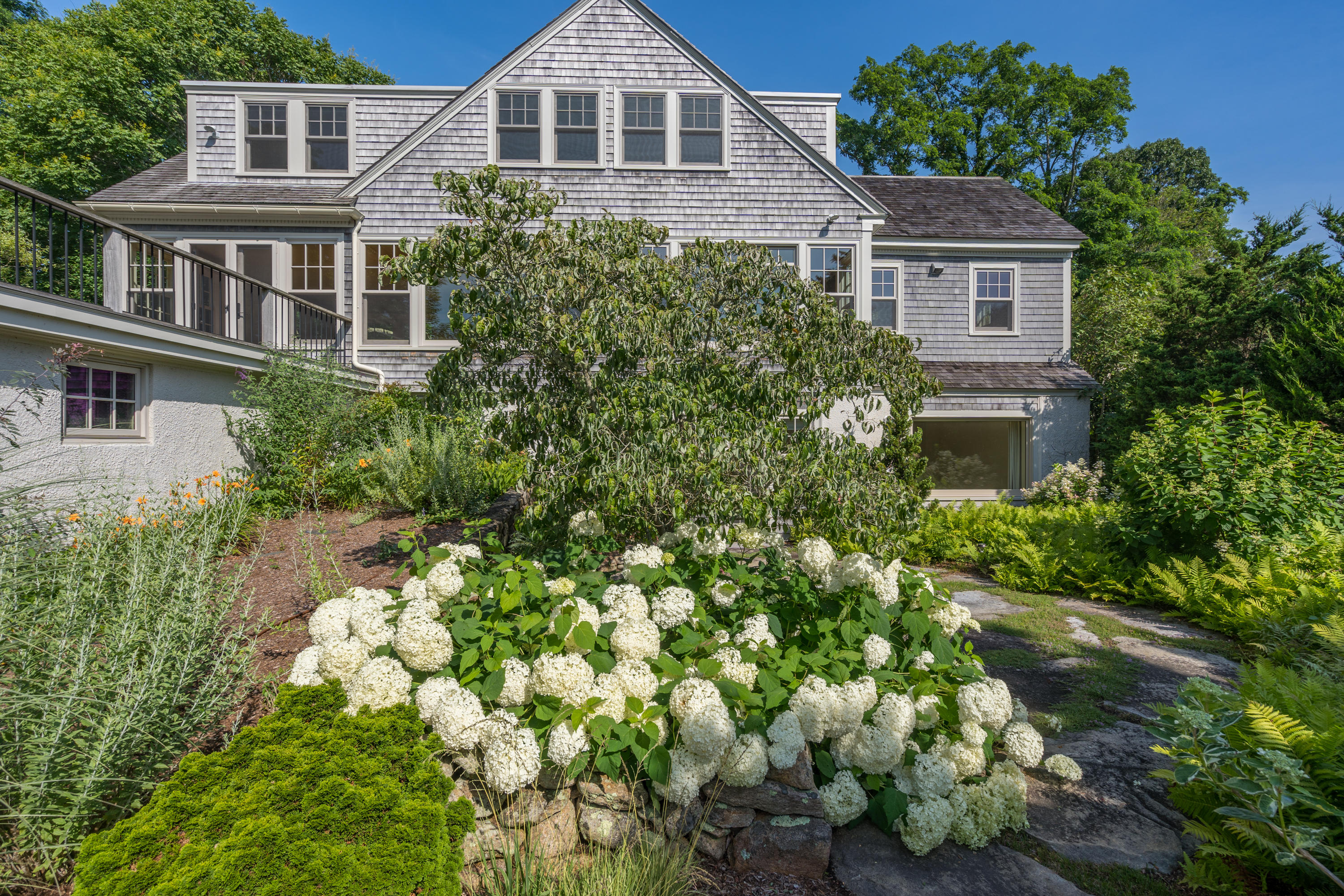 268 Elm Road Falmouth, MA 02540 - Photo 22 of 29 a front view of a house with a yard