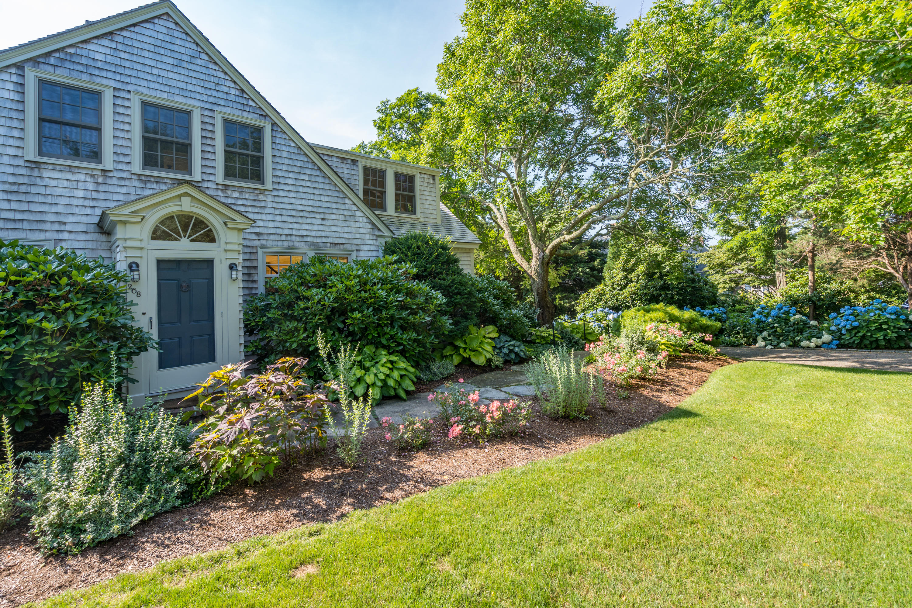 268 Elm Road Falmouth, MA 02540 - Photo 29 of 29 front view of a house with a yard
