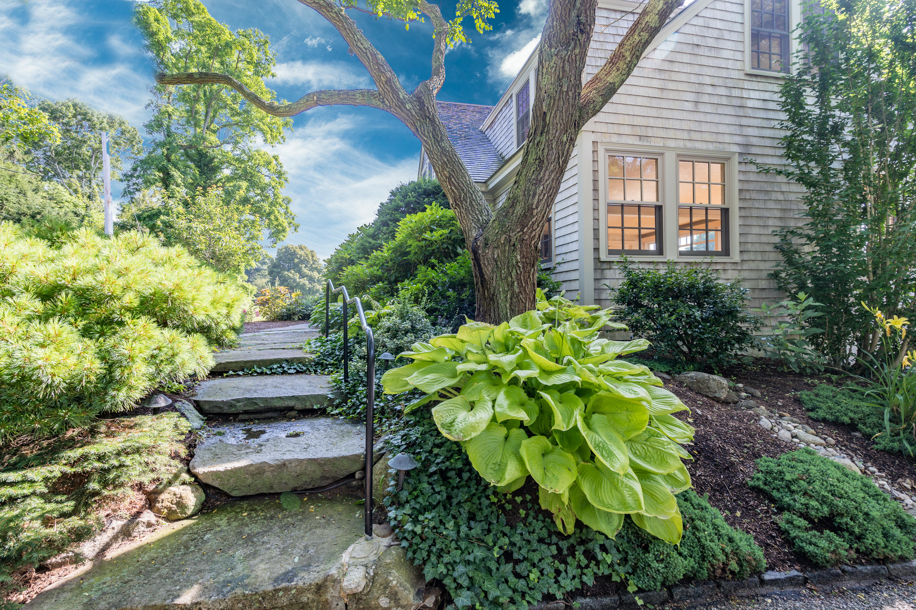 268 Elm Road Falmouth, MA 02540 - Photo 3 of 29 a backyard of a house with outdoor seating