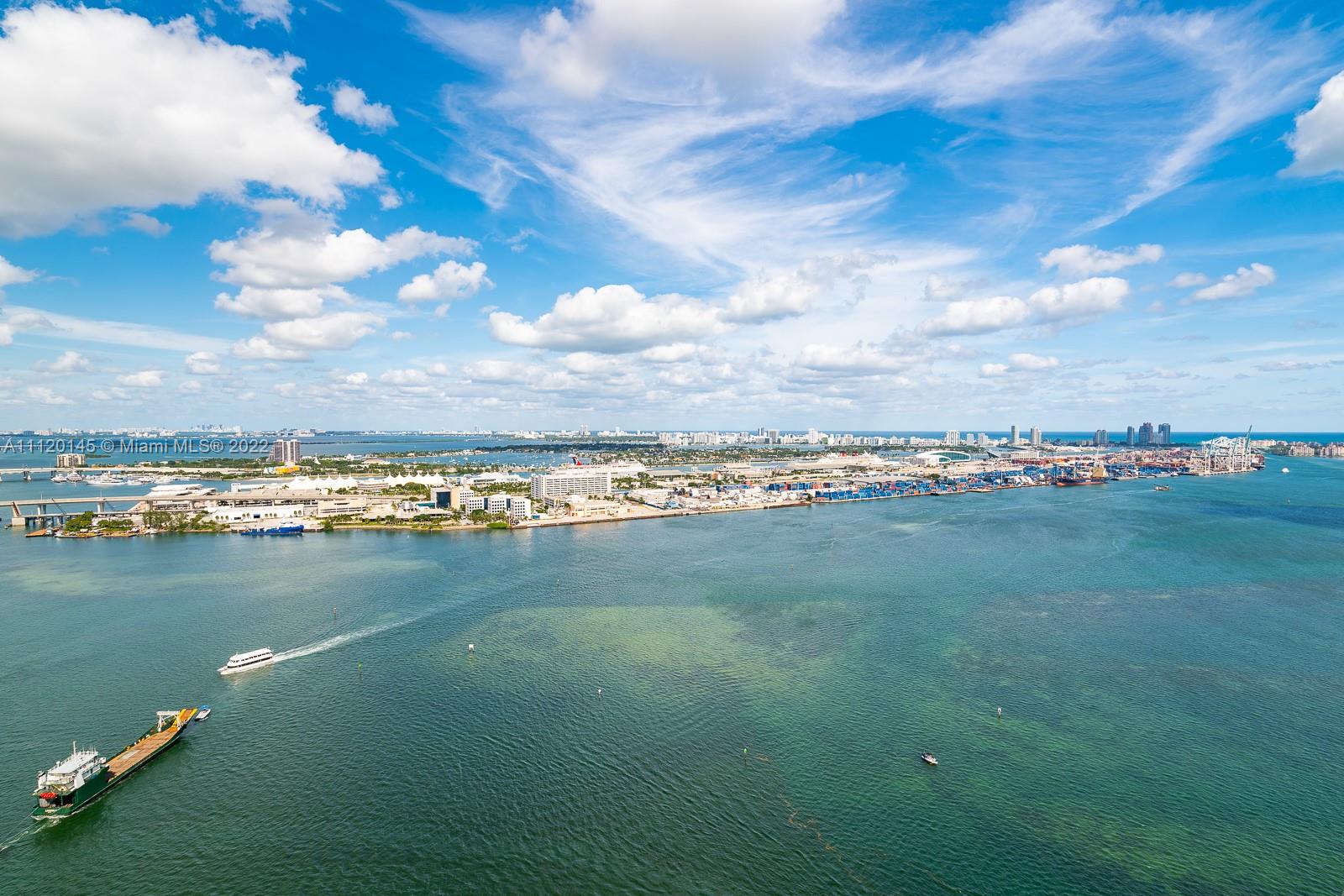 a view of a city with lots of green space