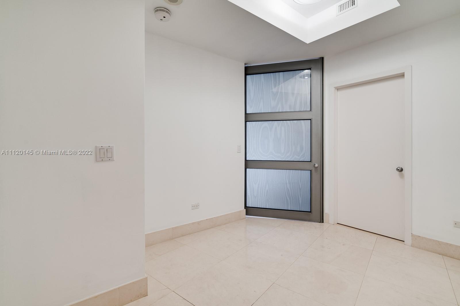 848 Brickell Key Drive, Unit 4002 Miami, FL 33131 - Photo 15 of 19 a view of an empty room