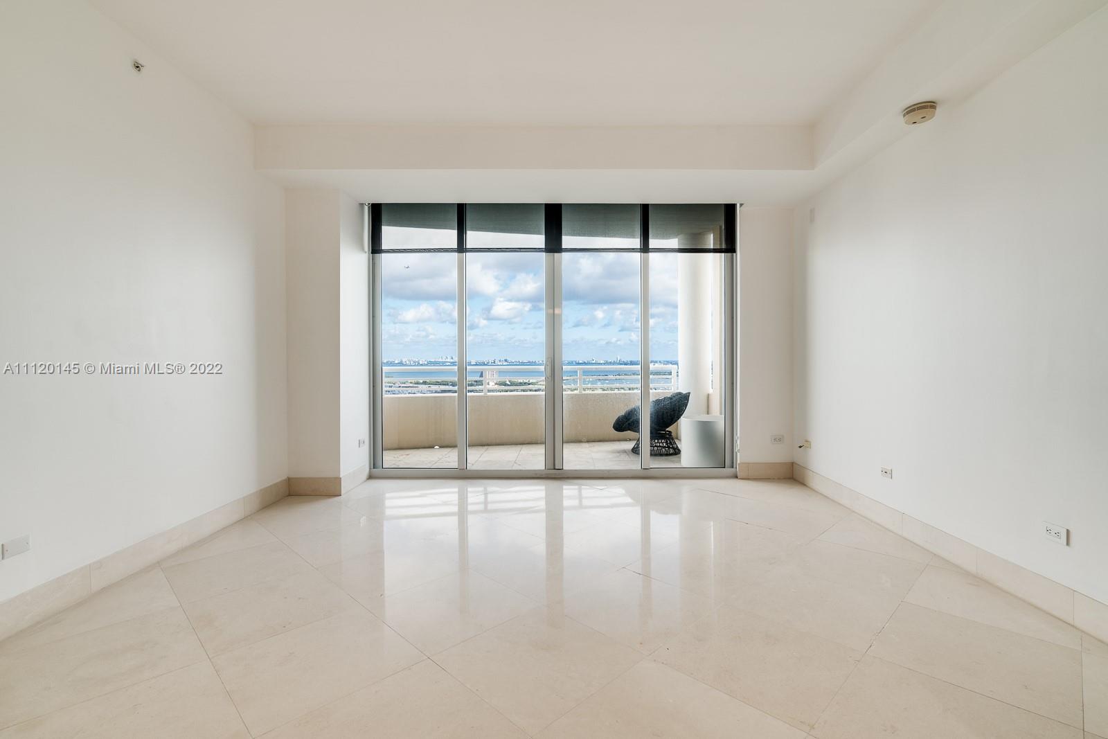 848 Brickell Key Drive, Unit 4002 Miami, FL 33131 - Photo 2 of 19 a view of an empty room with a window