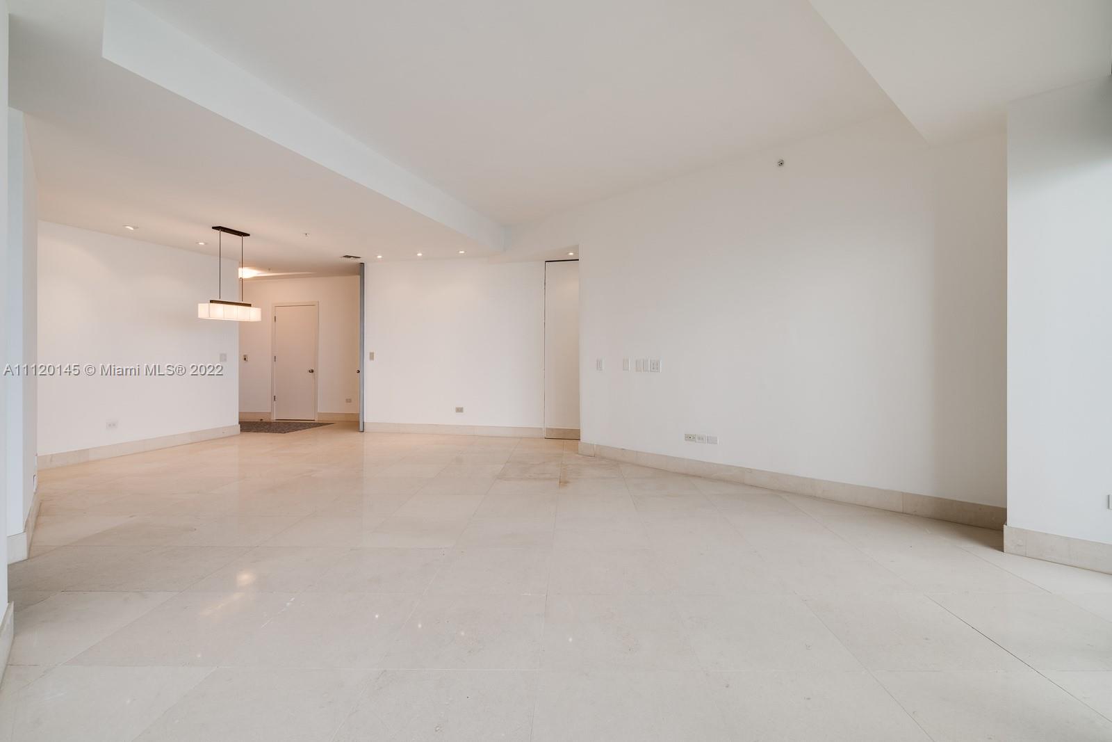 848 Brickell Key Drive, Unit 4002 Miami, FL 33131 - Photo 6 of 19 a view of an empty room