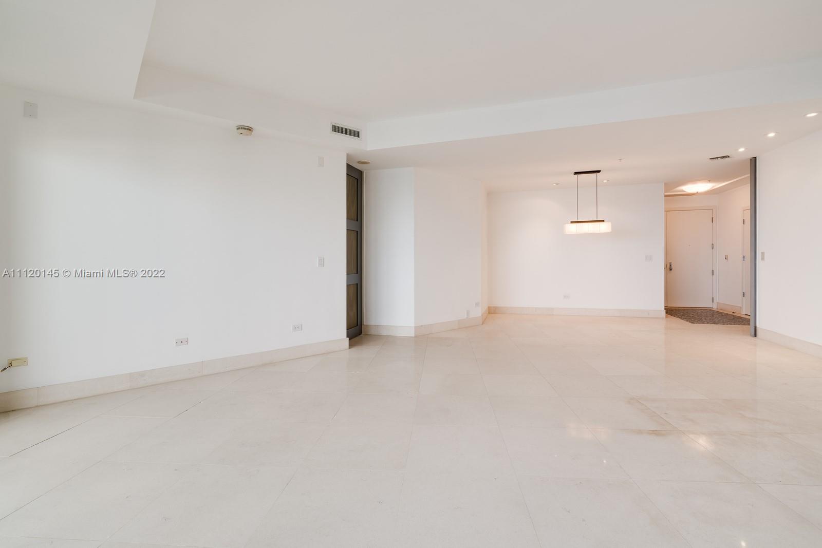 848 Brickell Key Drive, Unit 4002 Miami, FL 33131 - Photo 10 of 19 a view of an empty room