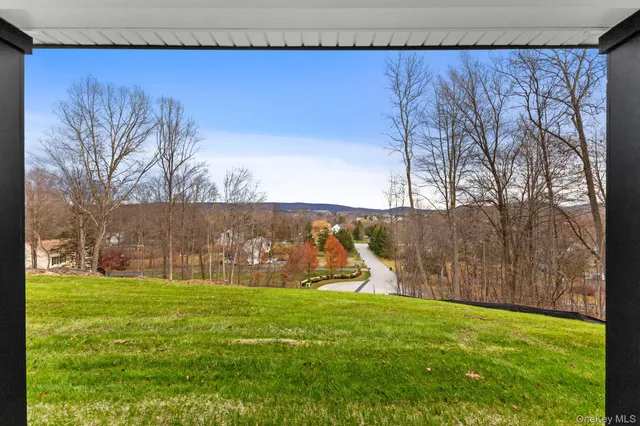 a view of a house with a big yard