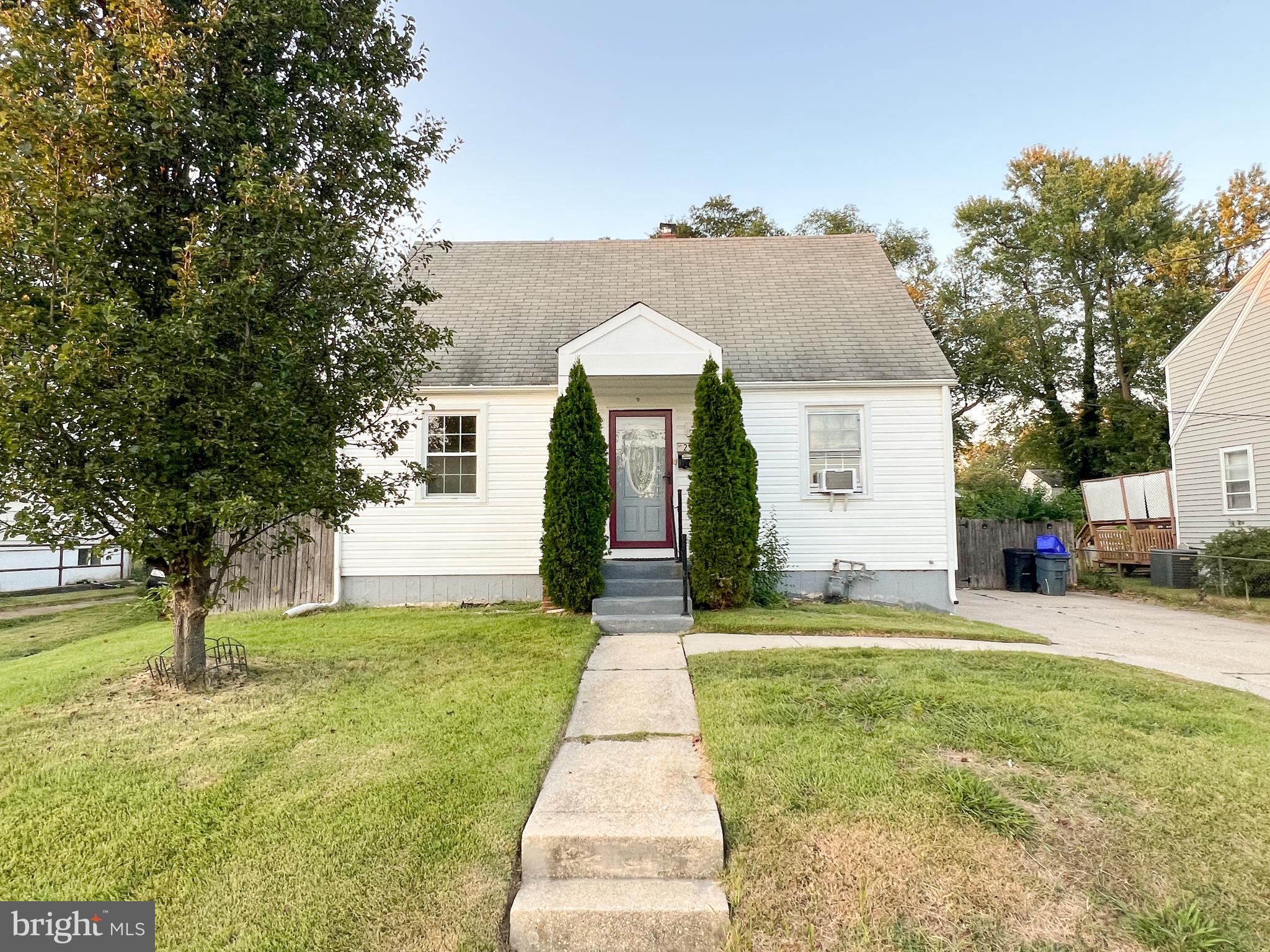 2515 Randolph Road Silver Spring, MD 20902 - Photo 1 of 36 a front view of a house with a yard