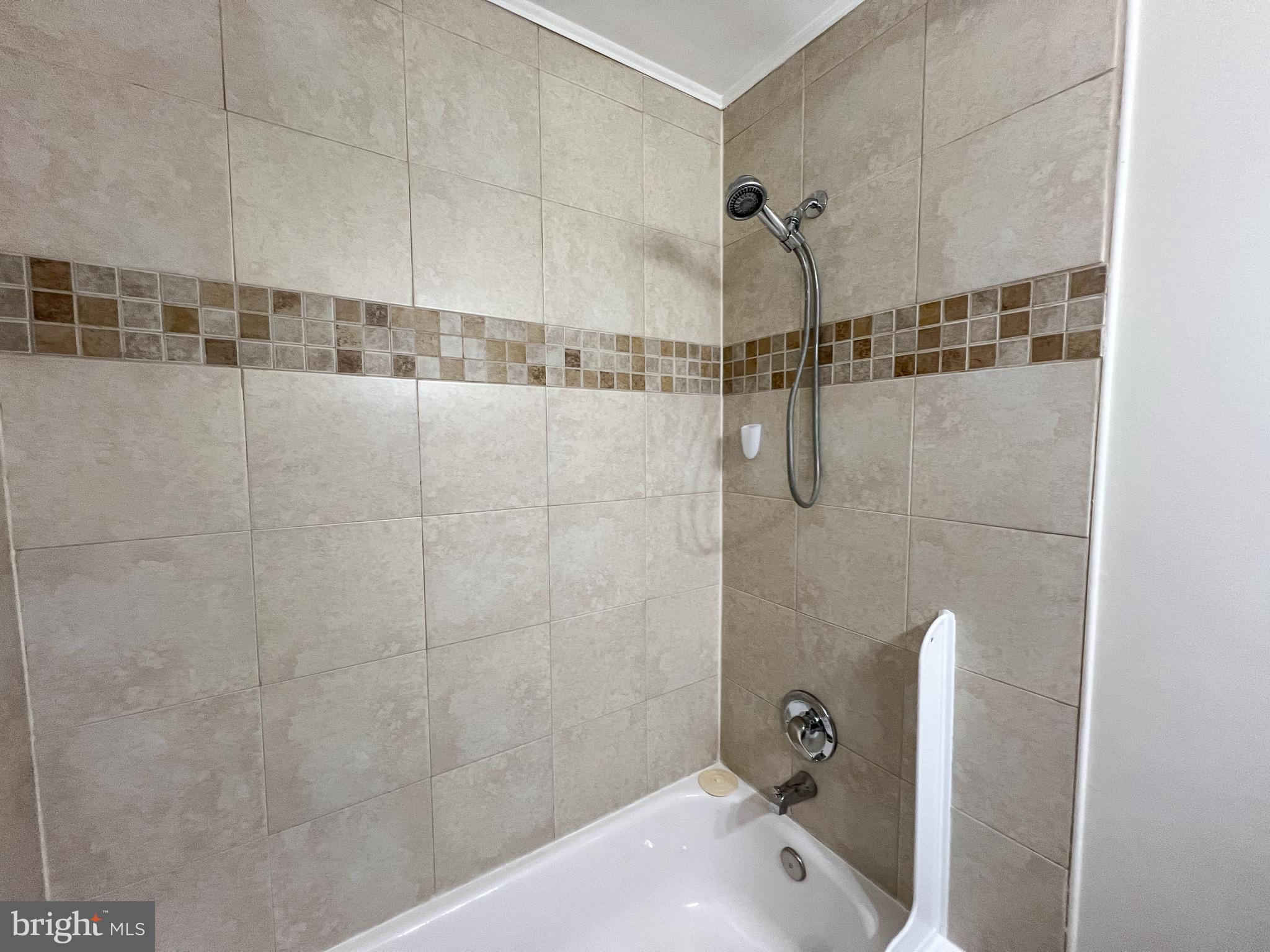 2515 Randolph Road Silver Spring, MD 20902 - Photo 18 of 36 a bathroom with a shower and a shower