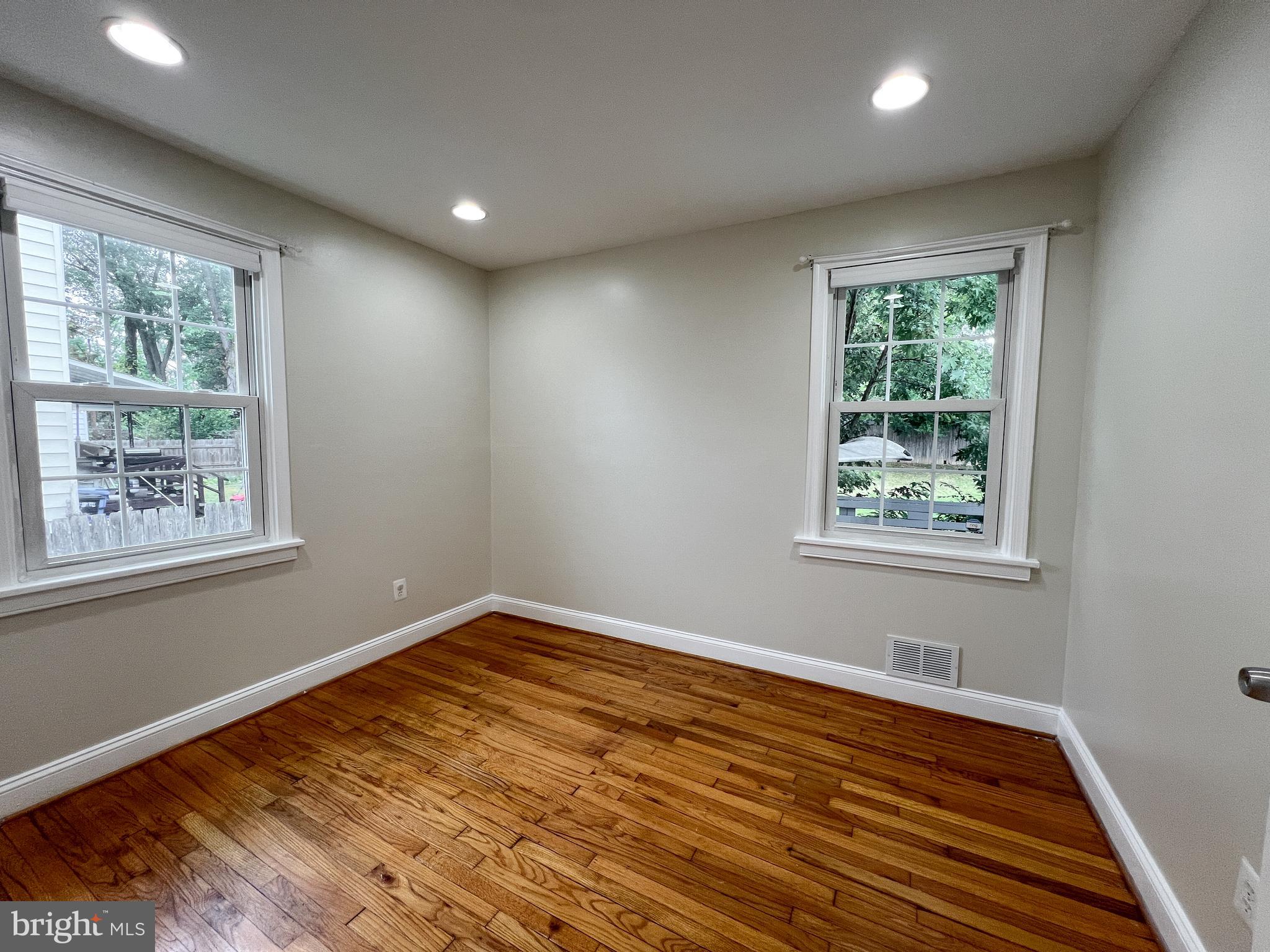 2515 Randolph Road Silver Spring, MD 20902 - Photo 21 of 36 a view of empty room with wooden floor and fan