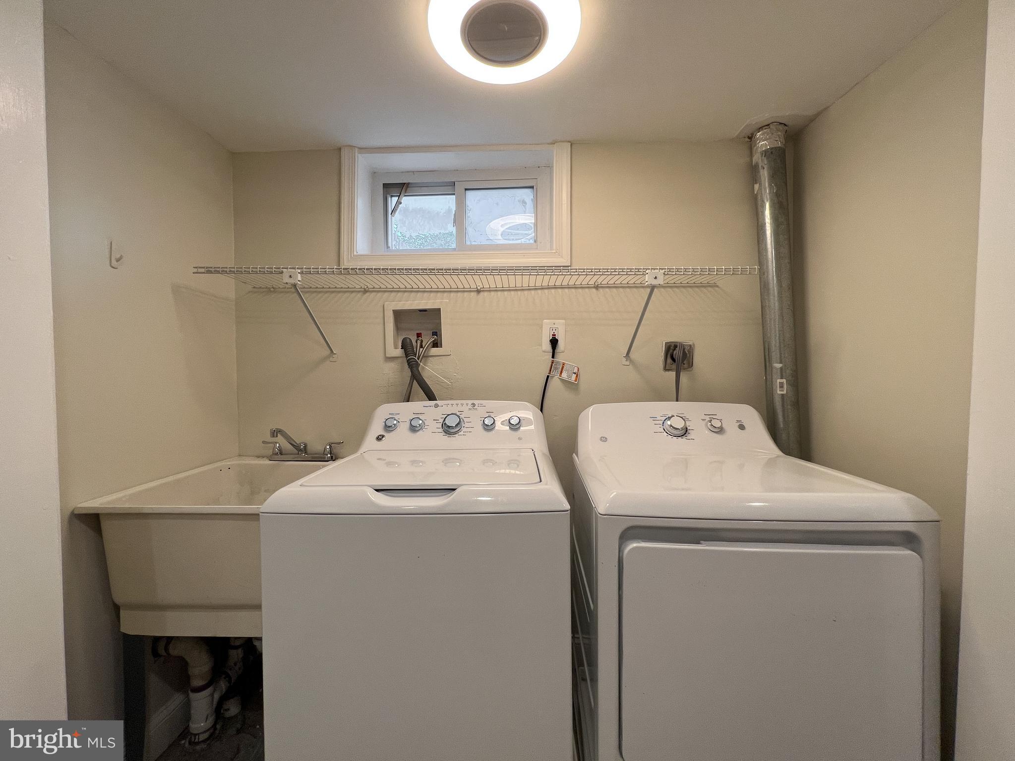 2515 Randolph Road Silver Spring, MD 20902 - Photo 32 of 36 a utility room with dryer and washer
