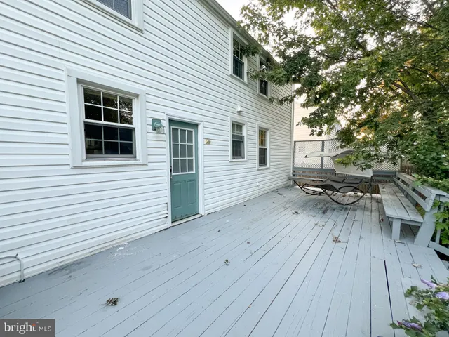 a backyard of a house with seating space
