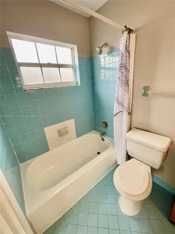 a view of a room & window in a room