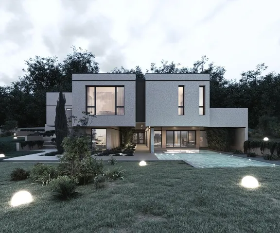 a view of a house with a yard and sitting area