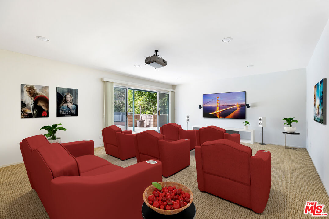 2860 Roscomare Road Los Angeles, CA 90077 - Photo 7 of 15 a living room with furniture and a window