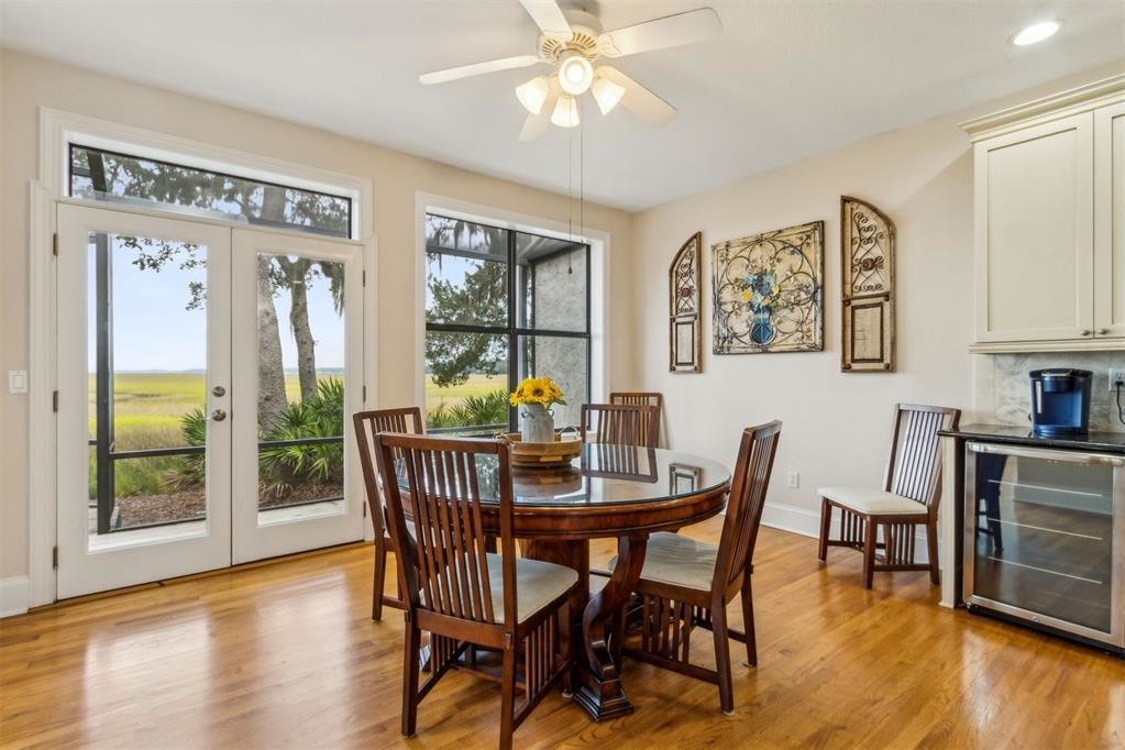 3119 Sea Marsh Road Fernandina Beach, FL 32034 - Photo 12 of 41 a view of a dining room with furniture window and wooden floor