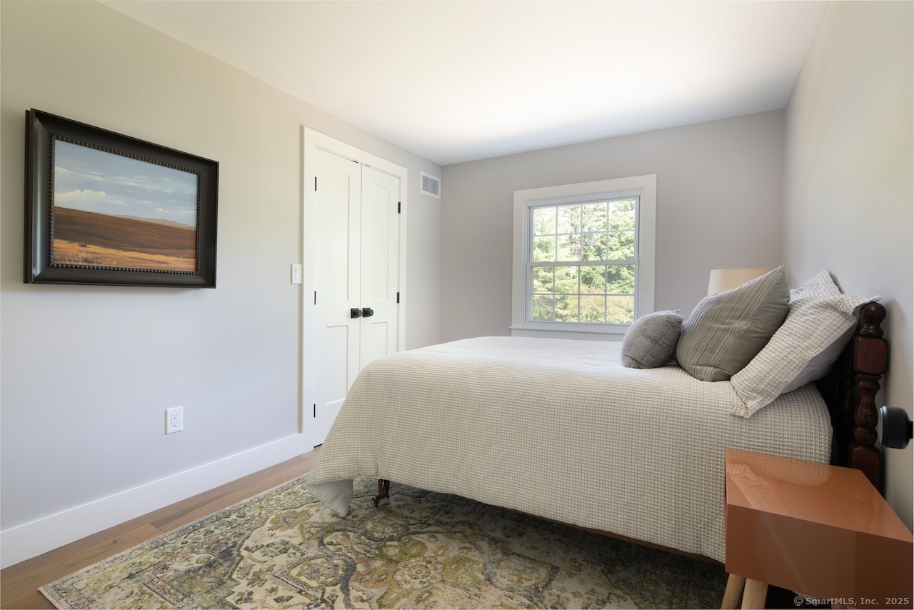 331 Calkinstown Road Sharon, CT 06069 - Photo 27 of 31 a bedroom with a bed and a window