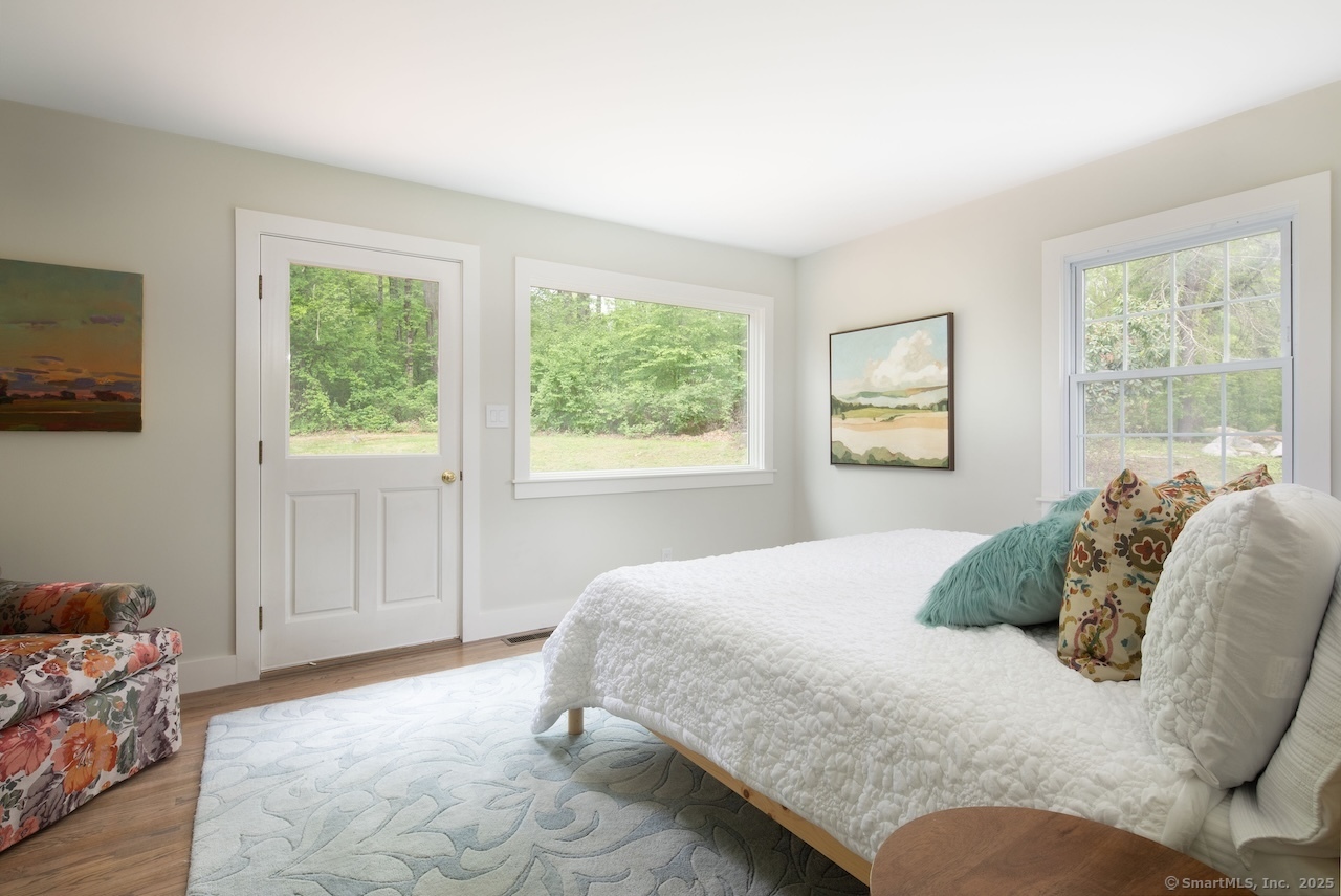 331 Calkinstown Road Sharon, CT 06069 - Photo 6 of 31 a bedroom with a bed and window