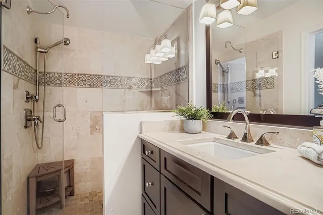 a bathroom with a sink double vanity and a mirror