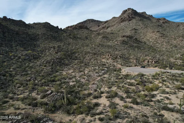 a view of mountains and valleys