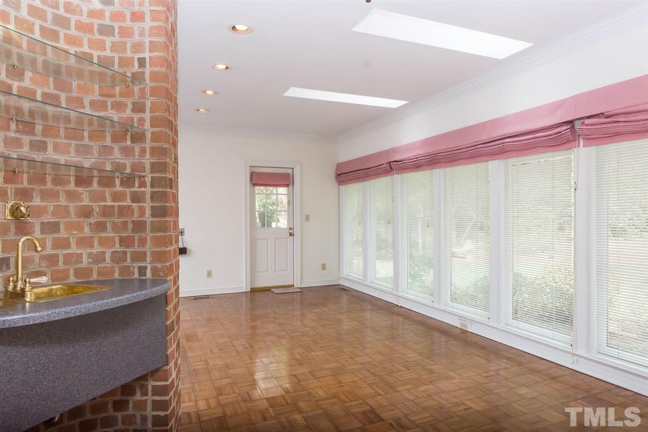 4012 John S Raboteau Wynd Raleigh, NC 27612 - Photo 12 of 25 a view of an empty room with a window