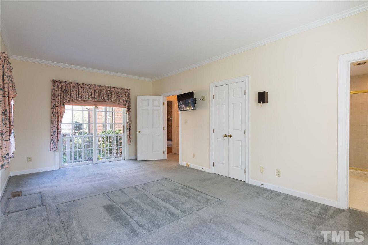 4012 John S Raboteau Wynd Raleigh, NC 27612 - Photo 17 of 25 a view of an empty room with a window