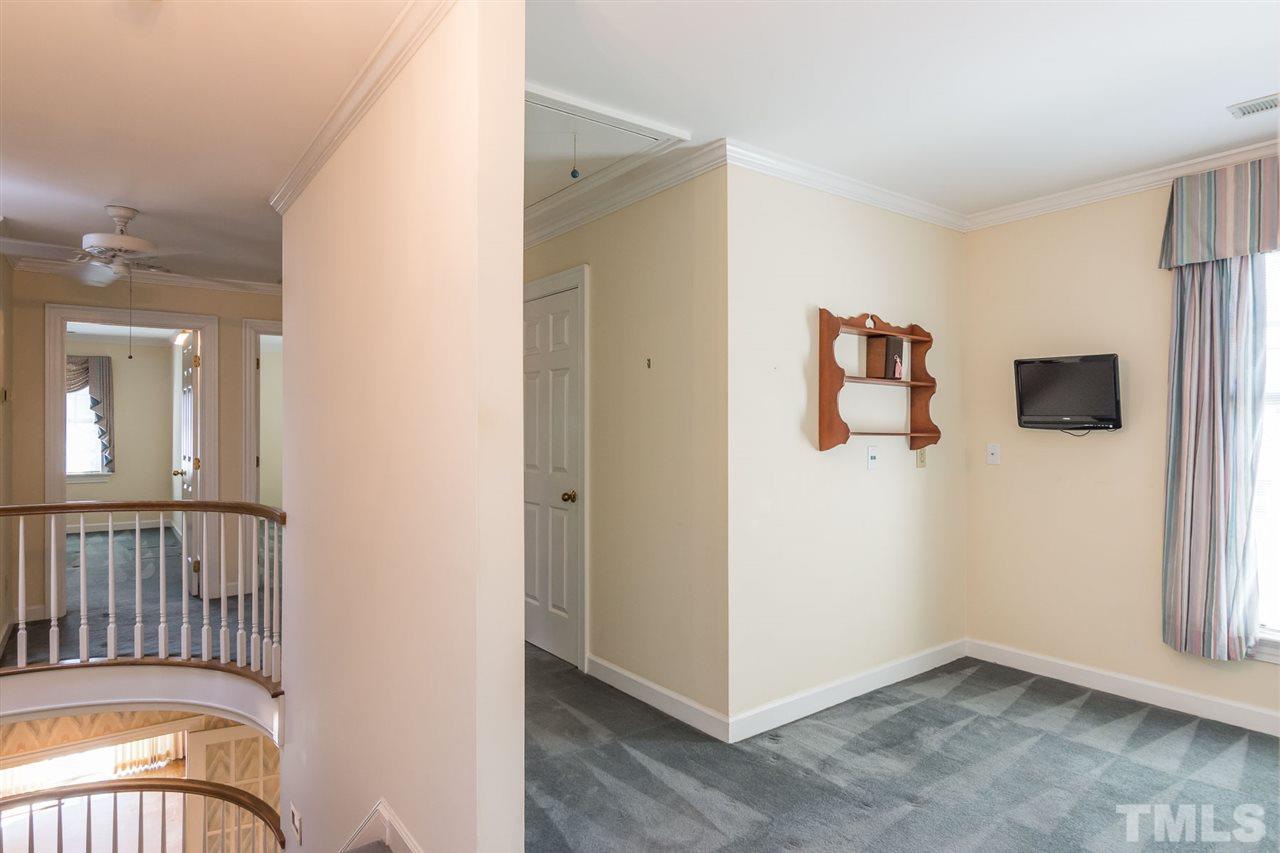 4012 John S Raboteau Wynd Raleigh, NC 27612 - Photo 18 of 25 an entryway with a workspace