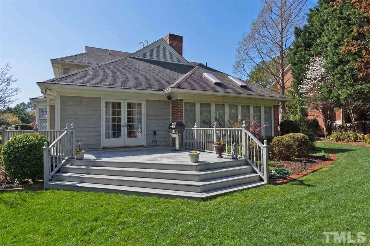 4012 John S Raboteau Wynd Raleigh, NC 27612 - Photo 24 of 25 a front view of a house with a garden