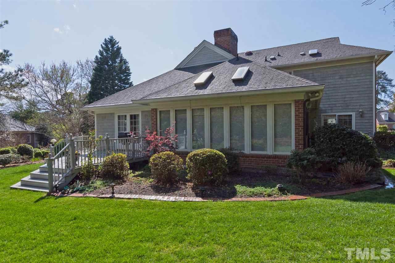 4012 John S Raboteau Wynd Raleigh, NC 27612 - Photo 25 of 25 a front view of house with a garden