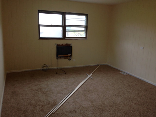 3552 Main Street Skokie, IL 60076 - Photo 8 of 8 an empty room with a window