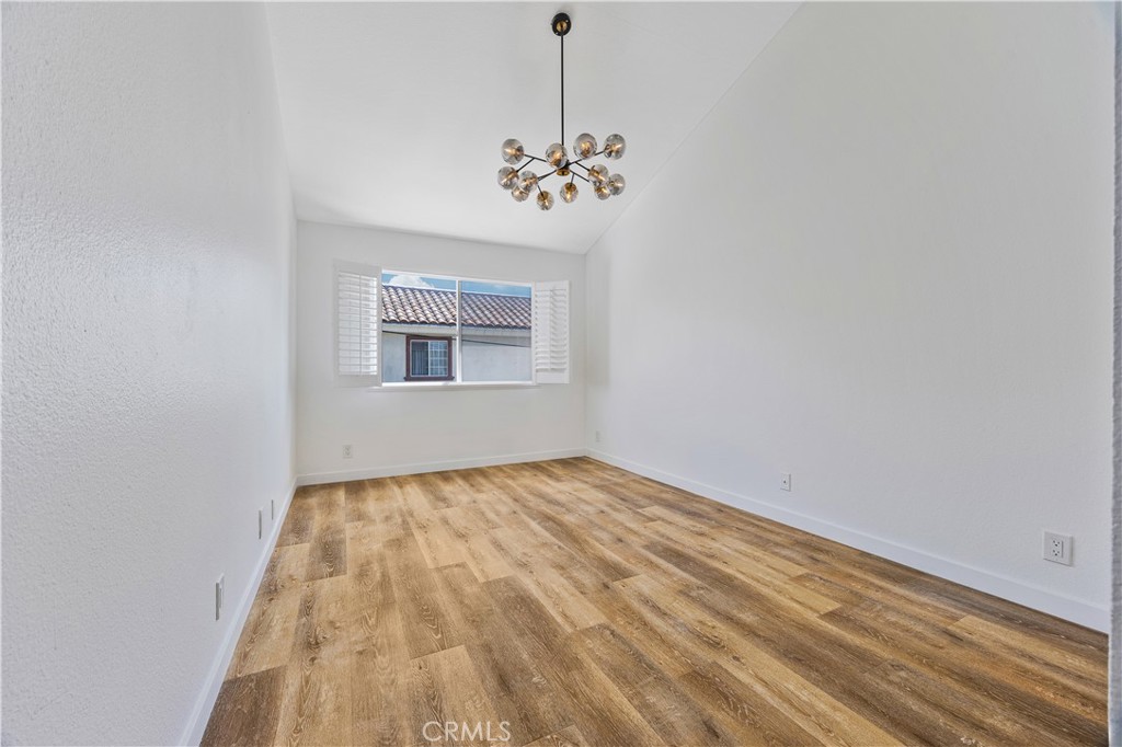1126 West 228th Street, Unit 16 Torrance, CA 90502 - Photo 22 of 32 a view of an empty room with window