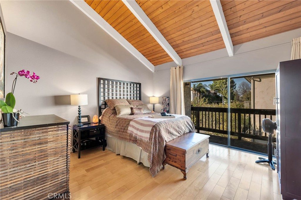 4222 Troost Avenue, Unit 21 Studio City, CA 91604 - Photo 15 of 47 a spacious bedroom with a bed and a window