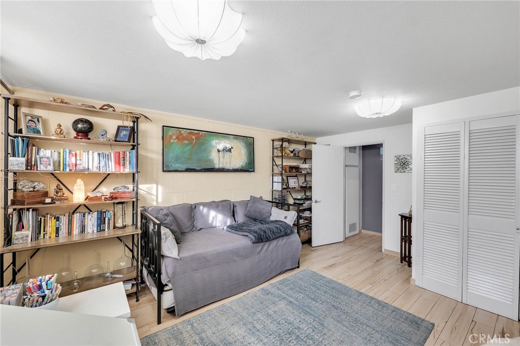 4222 Troost Avenue, Unit 21 Studio City, CA 91604 - Photo 17 of 47 a living room with furniture and a wooden floor