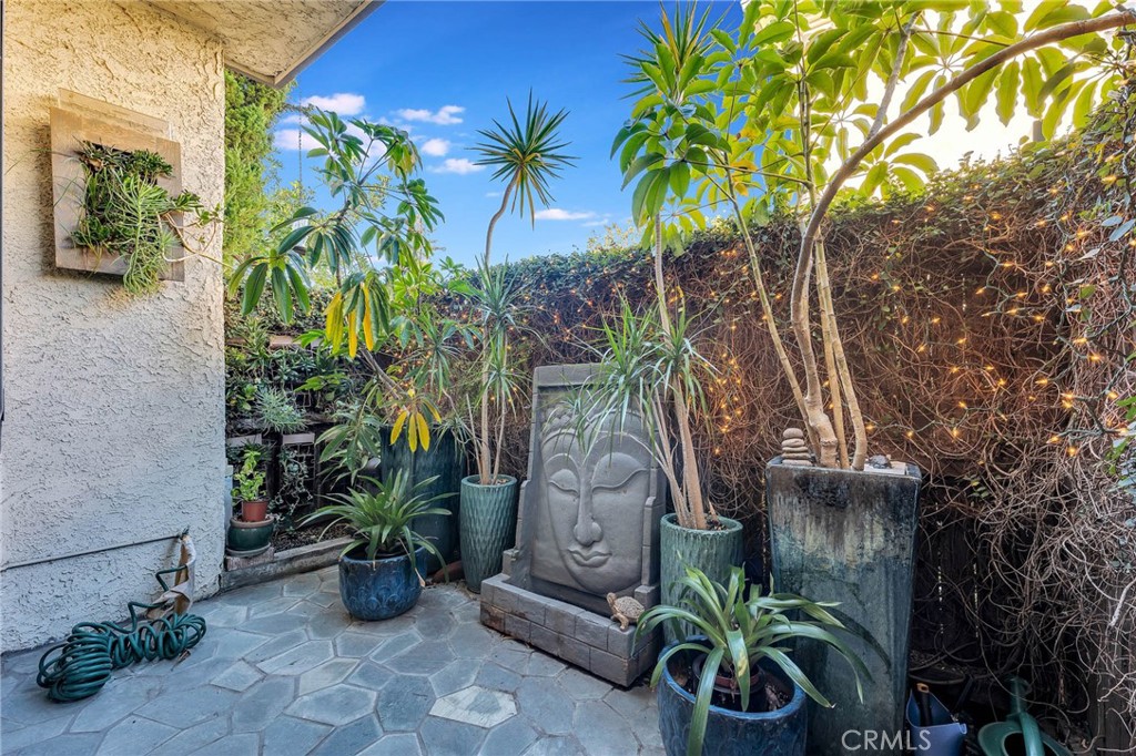 4222 Troost Avenue, Unit 21 Studio City, CA 91604 - Photo 24 of 47 a potted plant sitting in front of a building