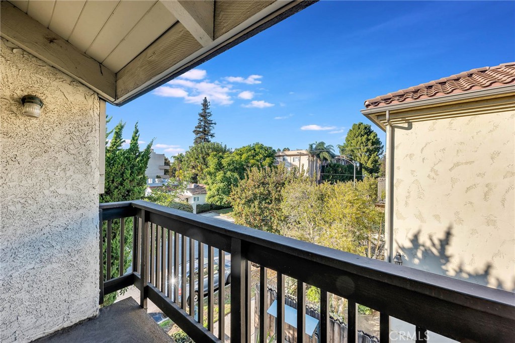 4222 Troost Avenue, Unit 21 Studio City, CA 91604 - Photo 27 of 47 a view of a balcony with an outdoor space