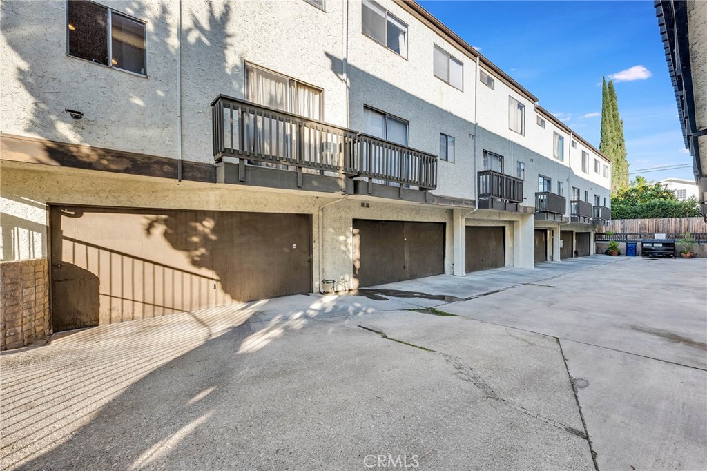 4222 Troost Avenue, Unit 21 Studio City, CA 91604 - Photo 31 of 47 a front view of a building with street
