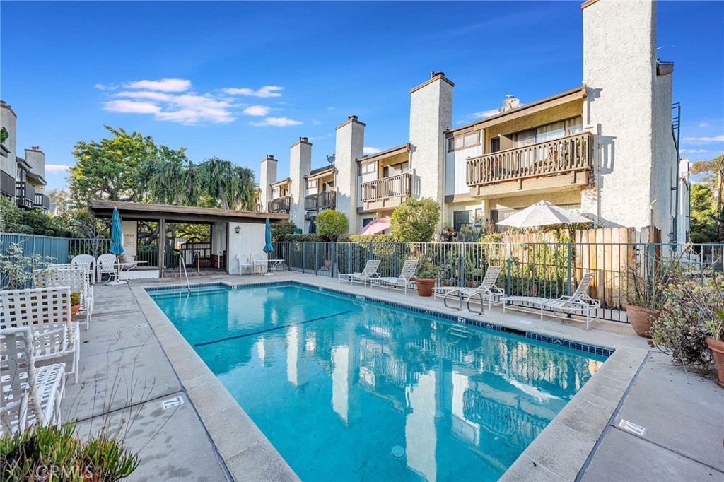 4222 Troost Avenue, Unit 21 Studio City, CA 91604 - Photo 34 of 47 a view of a swimming pool with a patio