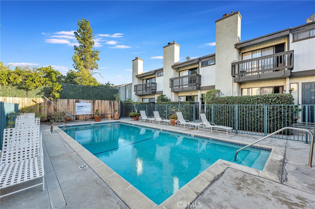 4222 Troost Avenue, Unit 21 Studio City, CA 91604 - Photo 35 of 47 a view of a swimming pool with a lounge chairs